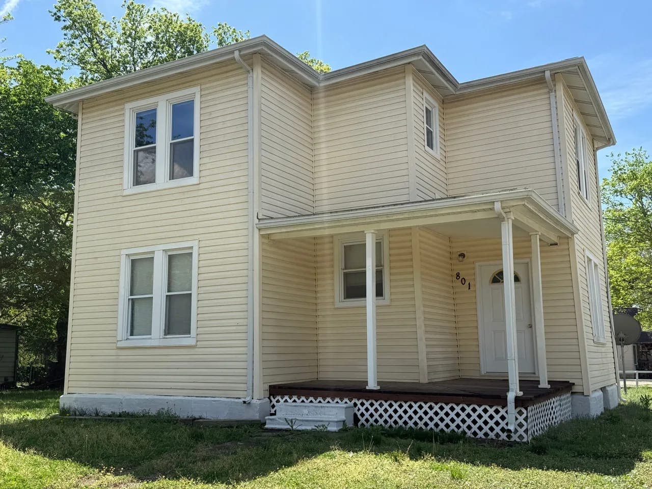 Two-story house with a covered front porch
